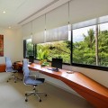 Awesome-Villa-Interior-Design-Ideas-With-cozy-Workspace-featuring-long-Wooden-Table-And-Modern-Chair-also-white-windows-blind-On-Villa-Padma-Phuket-Tahiland