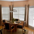 interior-furniture-dining-room-window-treatment-ideas-with-white-window-blinds-combine-striped-tan-curtain-and-walnut-laminate-wood-flooring-awesome-window-treatment-ideas